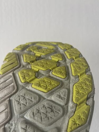 Close up picture of the grip of Hoka shoes that make them not great for pickleball